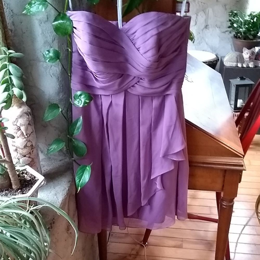 Short strapless lavender formal dress.